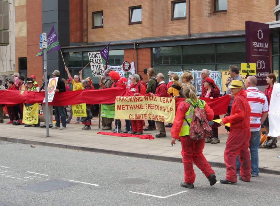 Anti-fracking protesters outside the Manchester Oil and Gas Summit in July 2016. PHOTO: Netpol